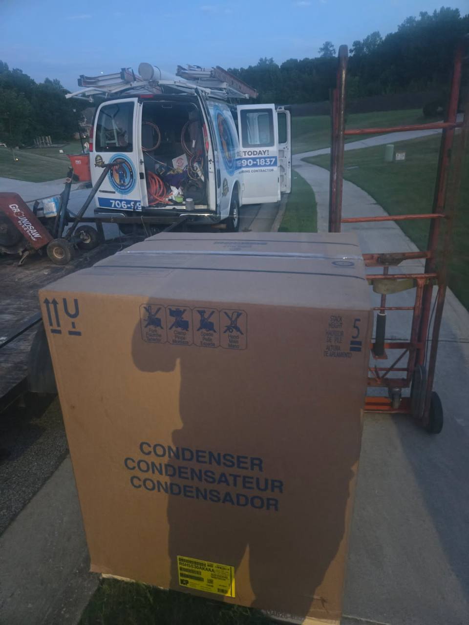 Glacier Comfort Experts service van at an active installation site